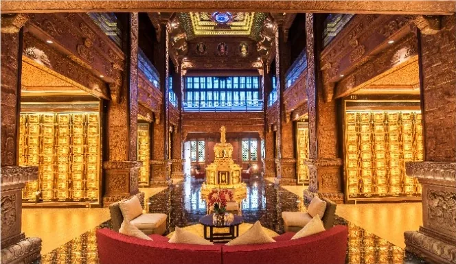 Ornate columbarium niches and visitor seating inside the Chamber of Eternal Bliss at Ming Palace